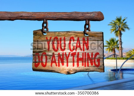 You can do anything motivational phrase sign on old wood with blurred background