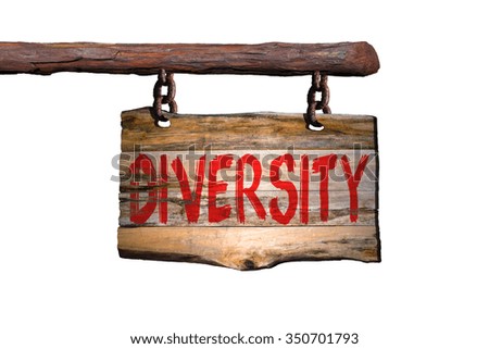 Diversity motivational phrase sign on old wood with blurred background