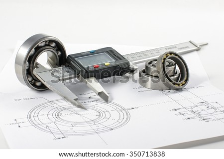 Bearing and caliper on the mechanical engineering drawing Royalty-Free Stock Photo #350713838