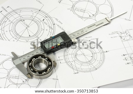 Bearing and caliper on the mechanical engineering drawing Royalty-Free Stock Photo #350713853