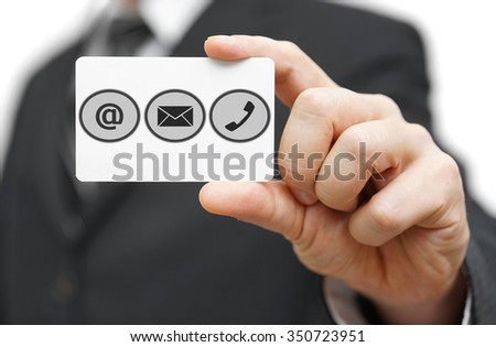 businessman hold business card  with identification symbols.  Support center icons