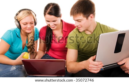 Group of students having fun, doing home work