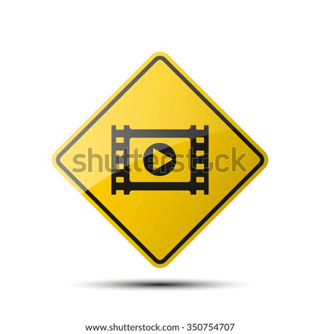 yellow diamond road sign with a black border and an image reel of film on white background. Vector Illustration