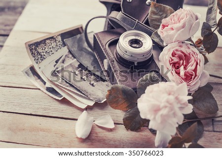 Vintage camera and roses