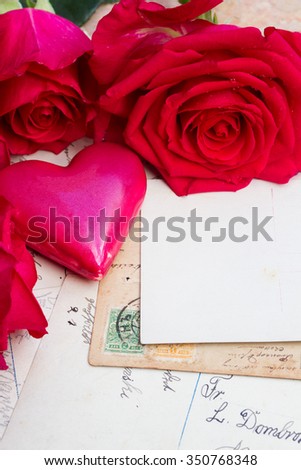 empty postcard with vintage mail, pink heart and fresh roses
