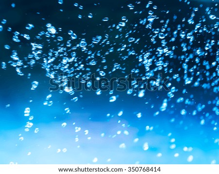 Abstract blured splashes of water background