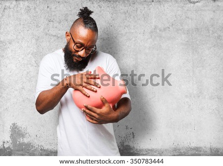 black man taking care of his piggy bank