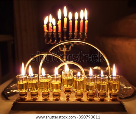 Hanukkah lights, oil lamp and candles together