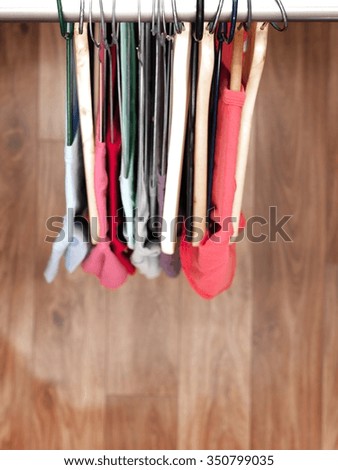 A studio image of hanging clothes