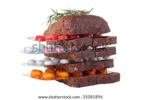 Hamburger with tablets on a white background