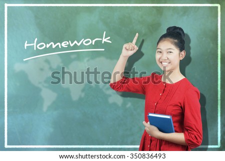The word "Homework" and cute Asian girl against chalkboard