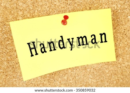Word Handyman on piece of paper on billboard background