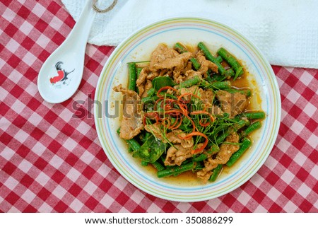 Spicy stir fried pork with red curry