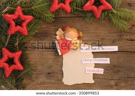 Christmas background with stars on fir tree over a textured background with merry Christmas text and happy new year - Merry Christmas lettering