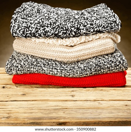 free space for your decoration ond closeup of wool sweaters 