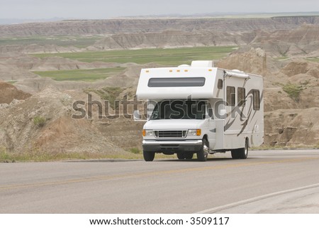 RV class C climbing scenic mountain road in the Badlands Royalty-Free Stock Photo #3509117