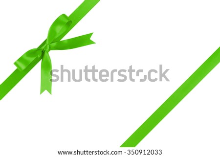 green ribbon with bow for packaging with tails isolated on white background