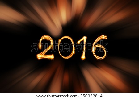 New year 2016 sparklers firework with abstract gold light zoom