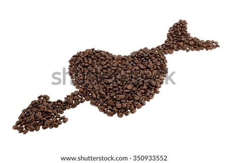 Roasted coffee beans placed in the shape of heart on white background