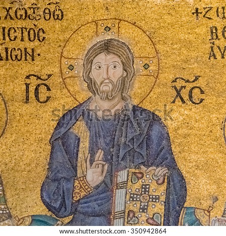 the face of Jesus with nimbus surrounded by saints and religious inscriptions