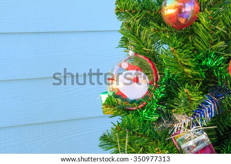 Santa Claus in baubles on chrismas tree,santa
