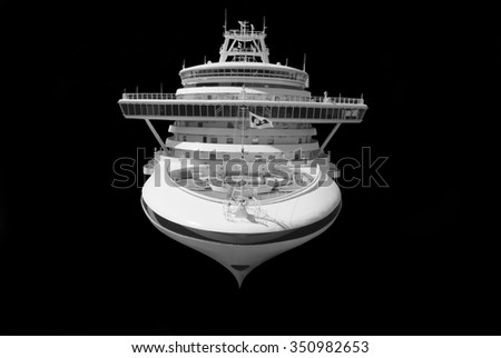 Large cruise ship isolated over black background