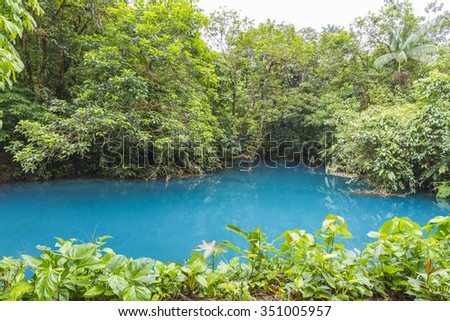 Rio Celeste, famous for it's blue colour due to dissolved salts from the Tenorio Volcano. It flows through forest on the flank of the volcano in Costa Rica