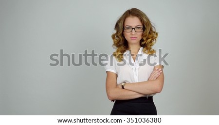 Portrait of smiling business woman, isolated on white background
