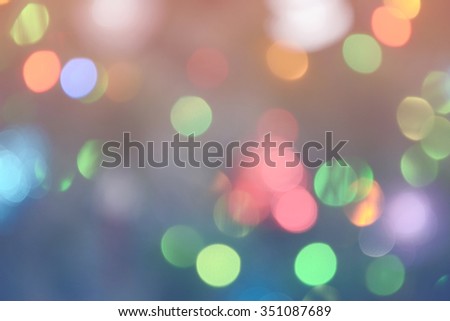 Bokeh lights background. Bokeh colorful circles on blue and pink background. Defocused lights. Photo can be used for web design, surface textures, wallpapers, printed products and other.