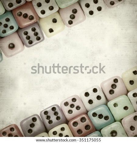 textured old paper background with many small dice