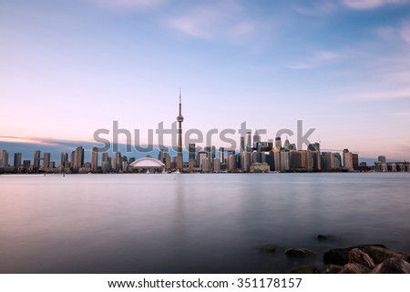 Toronto skyline with Lake Ontario in the foreground, as seen from Center Island. Long exposure.