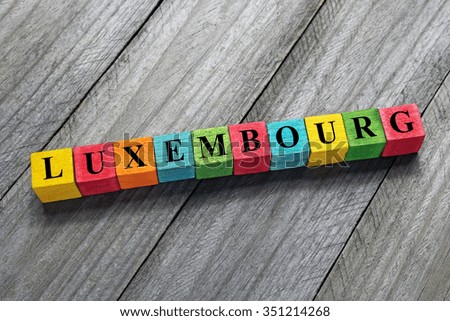Luxembourg word on colorful wooden cubes