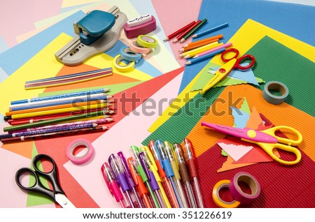 Arts and craft supplies. Corrugated color paper, pencils, different washi tapes, craft scissors. Royalty-Free Stock Photo #351226619