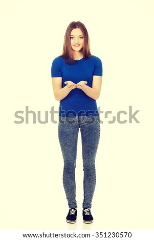 Teenage woman with open hands