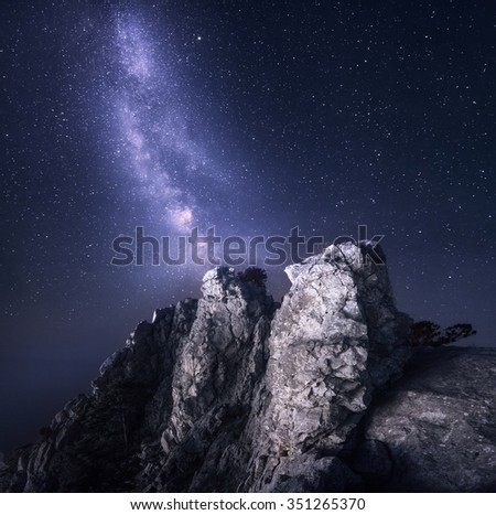 Milky Way. Beautiful night landscape with rocks and starry sky. Background