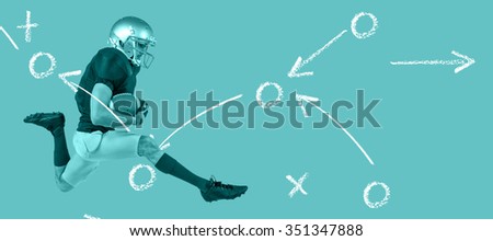 Full length of American football player running with ball against blue vignette background