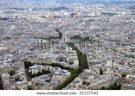 Color DSLR wide angle skyline of Paris, France, with the Arc de Triomphe at the center. Urban scene shot from top of Eiffel Tower. Horizontal with copy space for text.