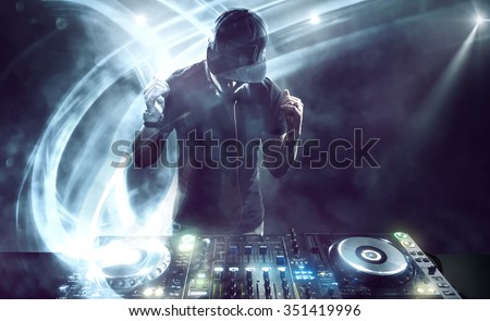 DJ with Turntables Royalty-Free Stock Photo #351419996