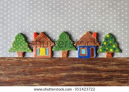 toy houses and fir trees