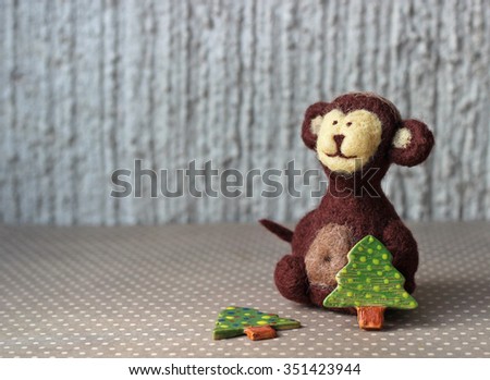 toy monkey and christmas tree