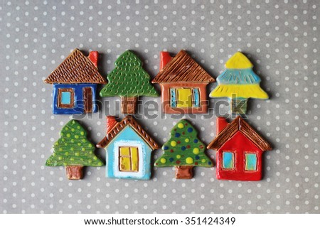 toy christmas trees and houses