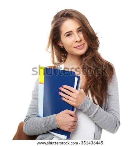Young happy student isolated on white background.