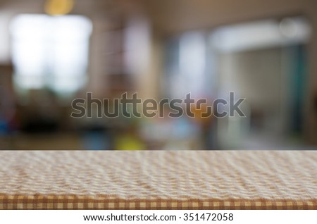 Checkered table cloth on empty table for Your photomontage or product display