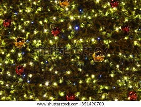 Christmas background with lights and bulbs