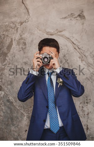 Groom portrait. Photographer