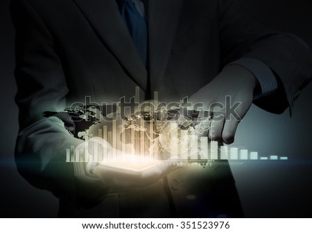 Close up of businessman holding virtual graph in palm