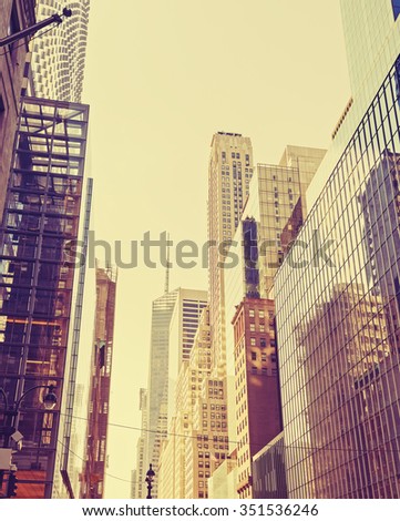 Vintage stylized photo of skyscrapers in Manhattan, New York City, USA.