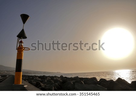 Photo Picture of an Modern Lighthouse near the Sea