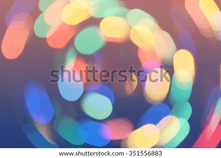 Bokeh lights background. Bright colors bokeh circles whirl defocused background. Holiday photo can be used for web design, surface textures, wallpapers, printed products and other.