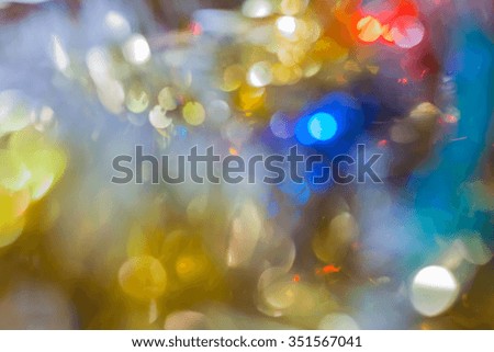 Christmas background. Festive abstract background with bokeh defocused lights and stars